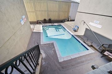 Los Angeles apartment for rent - A small pool with a blue tinted water.