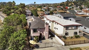 Los Angeles apartment for rent - A residential area with houses and trees.