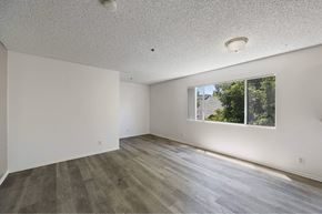 Los Angeles apartment for rent - A room with a window and wooden flooring.