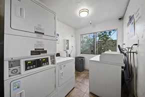 North Hills apartment for rent - A room with a washing machine and a dryer.
