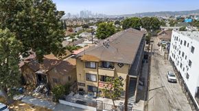 Los Angeles apartment for rent - A view of a residential area with houses and a street.
