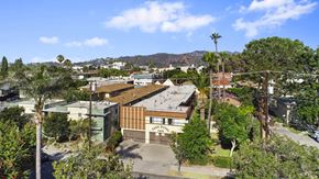Glendale apartment for rent - A view of a building with a sign that reads "BAR".