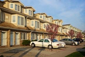 Staten Island apartment for rent - A white car is parked in front of a house. at Seaview Apartments in Staten Island, NY, 10305