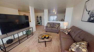 Box Elder apartment for rent - a living room with a couch and a television