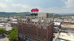 Box Elder apartment for rent - an aerial view of a building with a sign on top of it  at Antelope Ridge, Box Elder, South Dakota