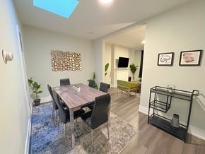 Chicago apartment for rent - A dining room with a table and chairs.