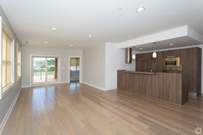Algonquin apartment for rent - A spacious room with wooden floors and a reception desk.