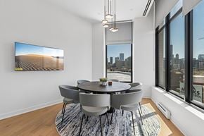 Chicago apartment for rent - A modern dining room with a large table and chairs.
