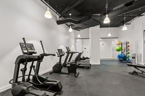 Chicago apartment for rent - A gym with treadmills and elliptical machines.
