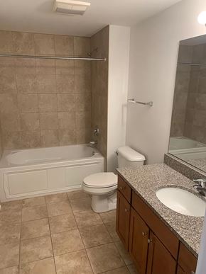 Chicago apartment for rent - a bathroom with a sink toilet and a bath tub