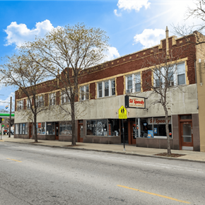 Chicago apartment for rent - A street view of a building with a sign that says "St. Speedy's".