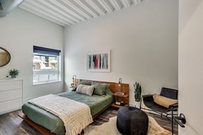 Chicago apartment for rent - a bedroom with a bed and a window