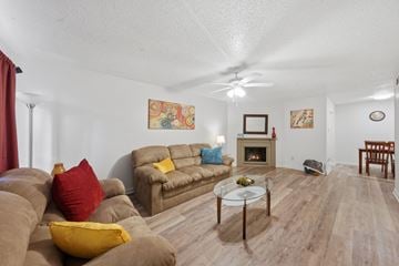 Lafayette apartment for rent - A living room with a brown couch and a glass coffee table.