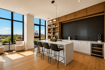 Chicago apartment for rent - A modern kitchen with a dining table and chairs.