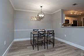 Lafayette apartment for rent - A dining room with a table and chairs.