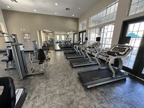 Clermont apartment for rent - A gym with treadmills and elliptical machines.