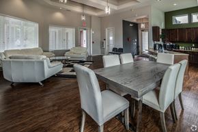 Orange Park apartment for rent - A modern dining room with a large table and chairs.