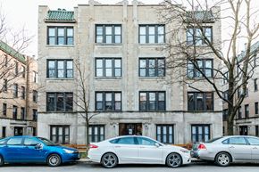 Chicago apartment for rent - Three cars parked in front of a building.