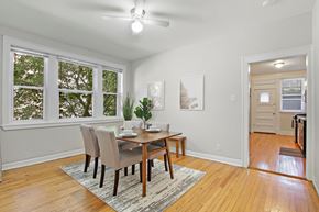 Chicago apartment for rent - A dining room with a table and chairs.