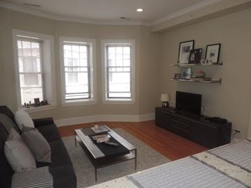 Evanston apartment for rent - a living room with a couch and a coffee table