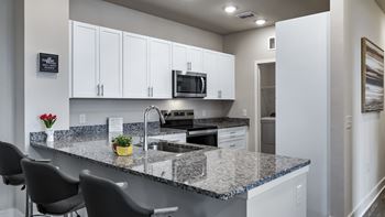 Designer kitchen with granite countertops