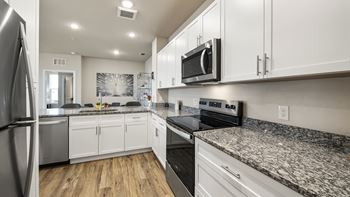 Designer kitchen with granite countertops