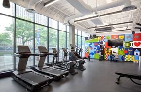 Chicago apartment for rent - A gym with treadmills and exercise equipment.