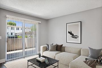 El Cajon apartment for rent - a living room with a couch and a table
