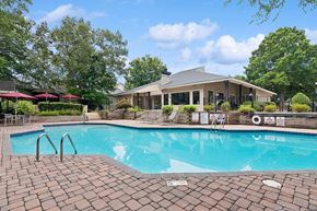 Charlotte apartment for rent - Community Swimming Pool with Pool Furniture at Park at Caterina Apartments located in Charlotte, NC.