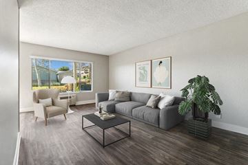 El Cajon apartment for rent - a living room with a couch and a table