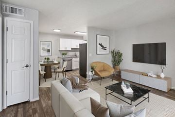 Tucson apartment for rent - a living room with a couch and a television