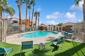 Las Vegas apartment for rent - Community Swimming Pool with Pool Furniture at Stonegate Apartments located in Las Vegas, NV.