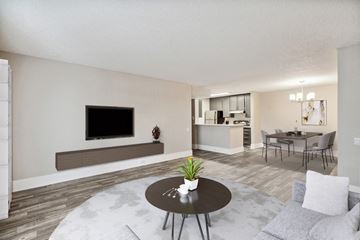Anaheim apartment for rent - our apartments offer a living room and dining area with a tv