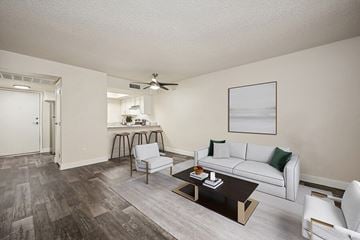 Glendale apartment for rent - A living room with a white couch and a coffee table.