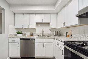 Marlborough apartment for rent - Marlborough, MA, Apartments for Rent - Meadows at Marlborough - Bright White Kitchen With Shaker Cabinets, Granite Look Countertops, Stainless Steel Dishwasher, And Electric Range.