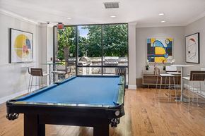 Alexandria apartment for rent - Community Clubhouse with Game Tables and Lounge Furniture at Mason Van Dorn Apartments located in Alexandria, VA.