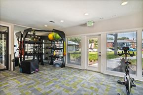 St. Petersburg apartment for rent - North St. Petersburg, FL, Apartments Near Pinellas Park High School - Bridges at Bayside - A Fitness Center With A Training Rack, Medicine Balls, Resistance Bands, And Stationary Bike.