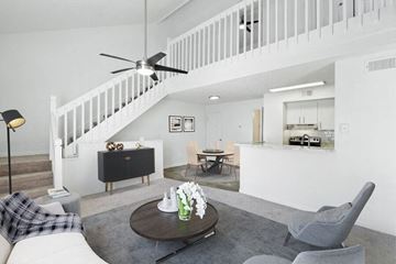 Kissimmee townhouse for rent - a living room with a couch and a table