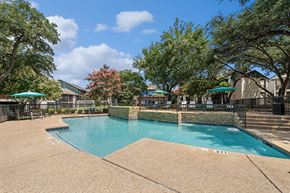 Dallas apartment for rent - Community Swimming Pool with Pool Furniture at Bridges at Deer Run Apartments in Dallas, TX.
