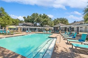 Dallas apartment for rent - Community Swimming Pool with Pool Furniture at Allure North Dallas Apartments in Dallas, TX.