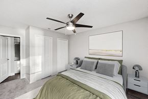 Jacksonville apartment for rent - Model Bedroom with Carpet and attached Bathroom at Vue at Baymeadows Apartments in Jacksonville, FL.