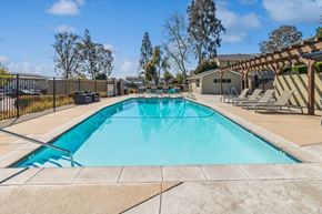 El Cajon apartment for rent - Community Pool & Pool Furniture at Forest Park Apartments in El Cajon, CA.