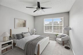 Antioch apartment for rent - Model Bedroom with Carpet and Window View at Abbington Heights Apartments in Antioch, TN.