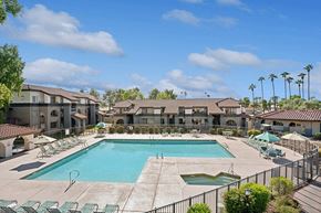Glendale apartment for rent - Community Swimming Pool with Pool Furniture at Stillwater Apartments located in Glendale, AZ.