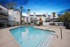 Phoenix apartment for rent - Community Swimming Pool with Pool Furniture at Crystal Creek Apartments in Phoenix, AZ.