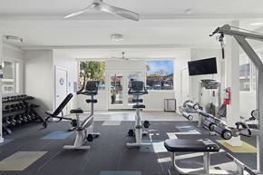 San Jose apartment for rent - San Jose, CA, Pet-Friendly Affordable Apartments - Los Gatos Landing - A Fitness Center With Stationary Bikes, Weight Benches, And Dumbbell Rack.