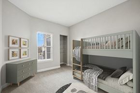 Herndon townhouse for rent - Model Bedroom with Carpet and Walk In Closet at Dulles Green Apartments located in Herndon, VA.
