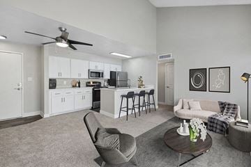Phoenix apartment for rent - an open kitchen and living room with a couch and a table