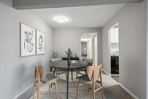 Silver Spring apartment for rent - Model Dining Room with Carpet and View of Kitchen at Spring Parc Apartments in Silver Spring, MD.