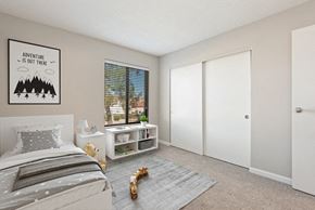 Phoenix apartment for rent - Model apartment bedroom with a bed and a window at Saratoga Ridge, Phoenix, 85022